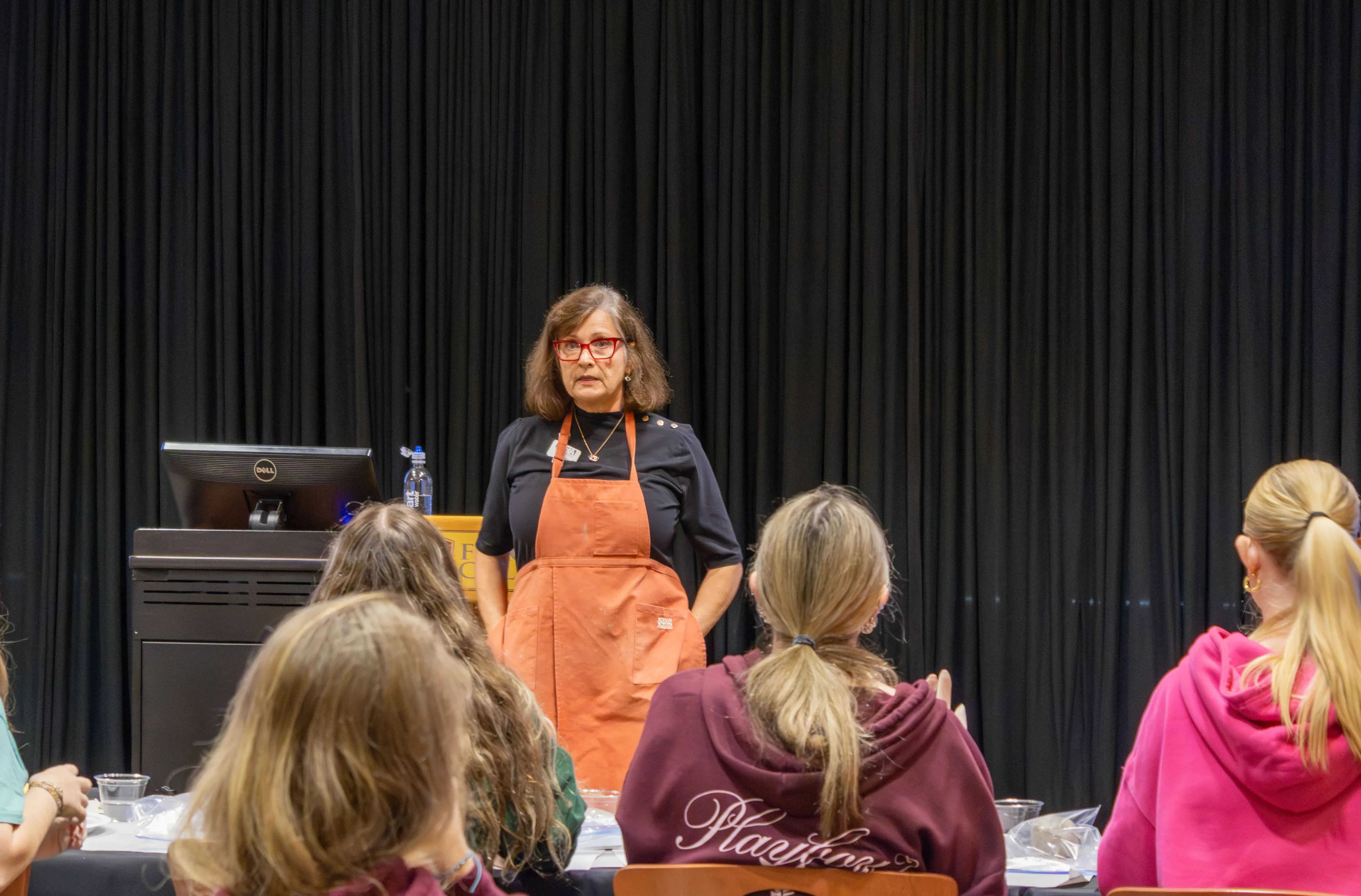 Laura Burgess leading her tile making seminar