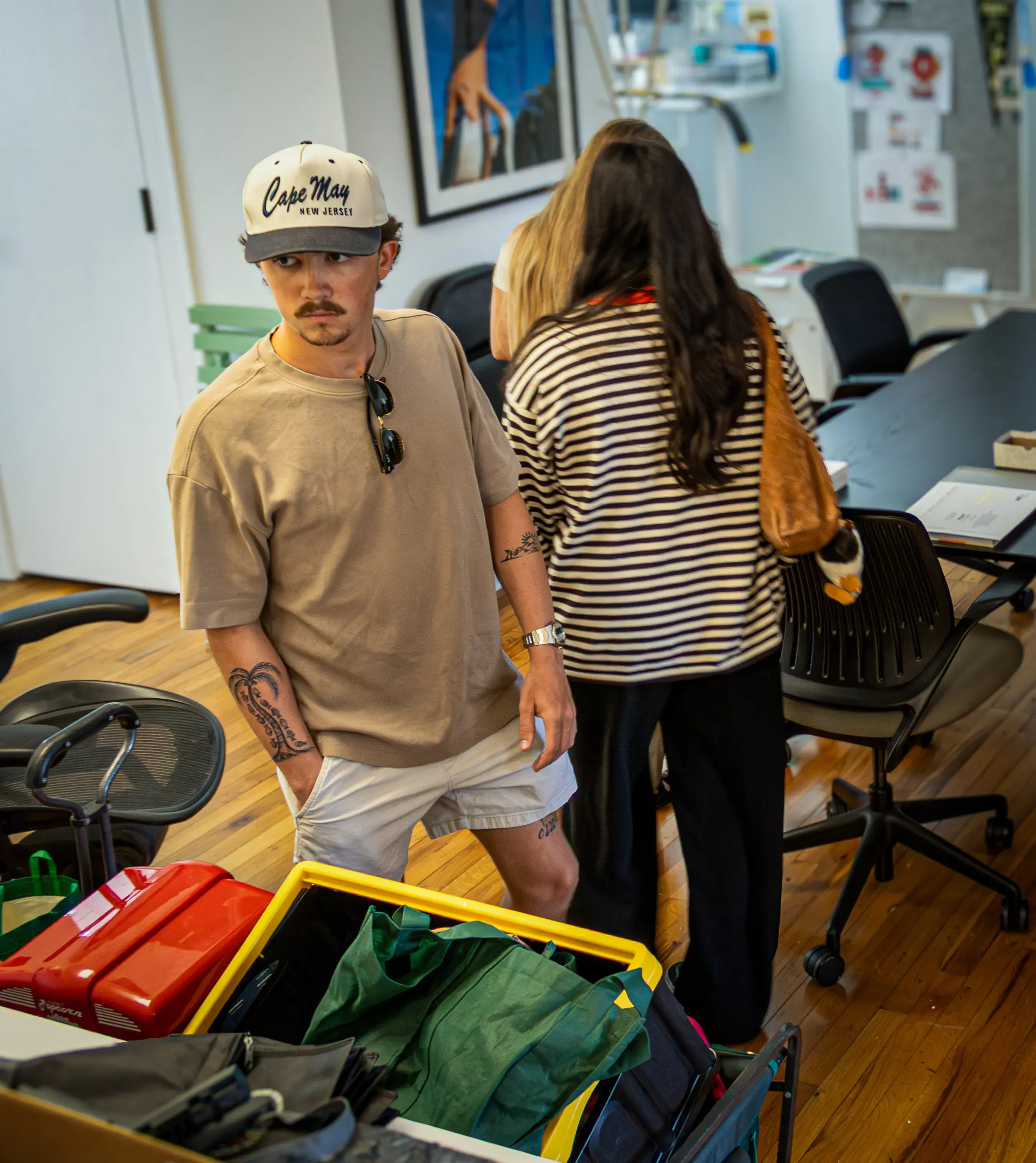 A student walking around the interior of Wingard marketing