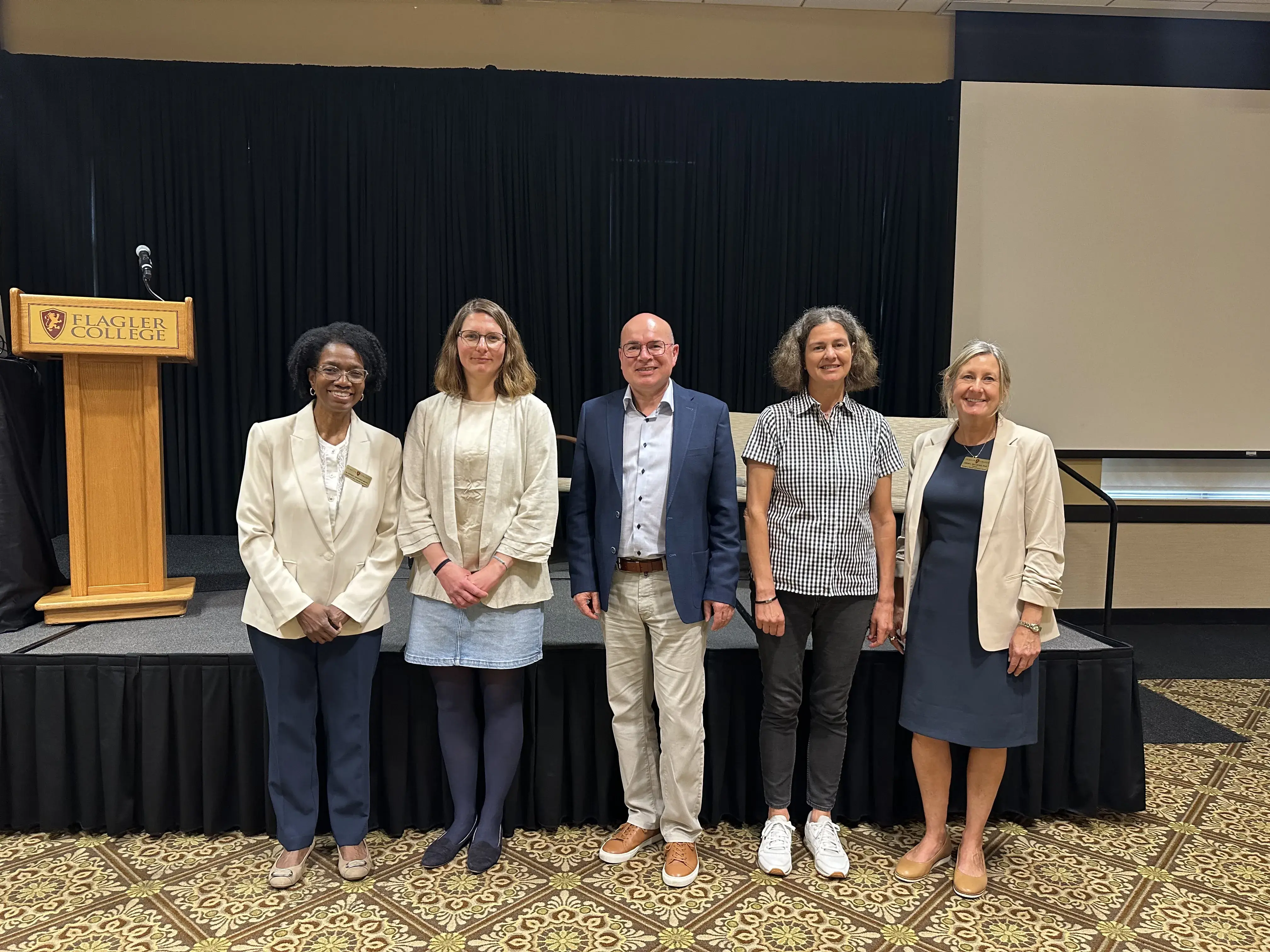 A staged photo featuring the leaders of Flagler's Germany cohort program