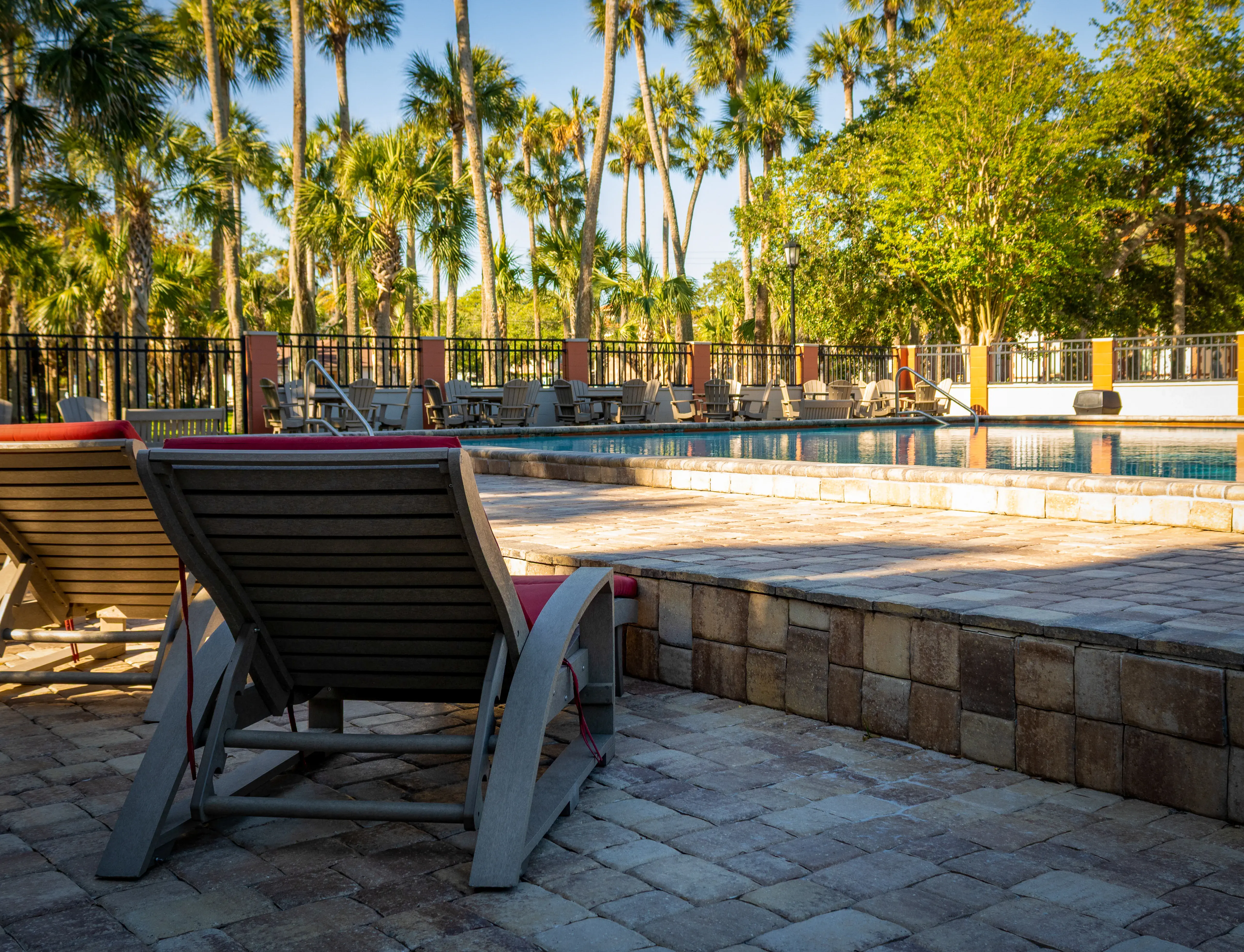A seat on the empty pool deck