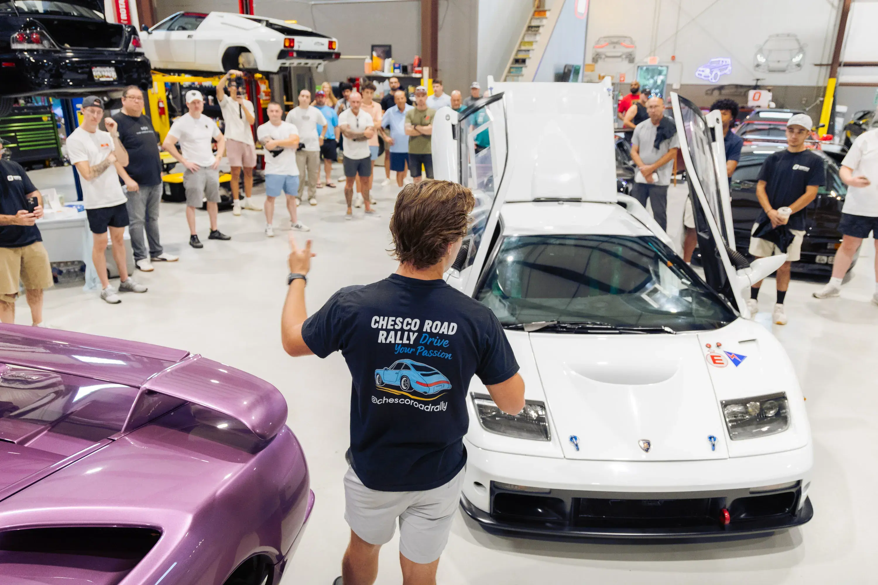 Logan Sarosi addressing his car club members