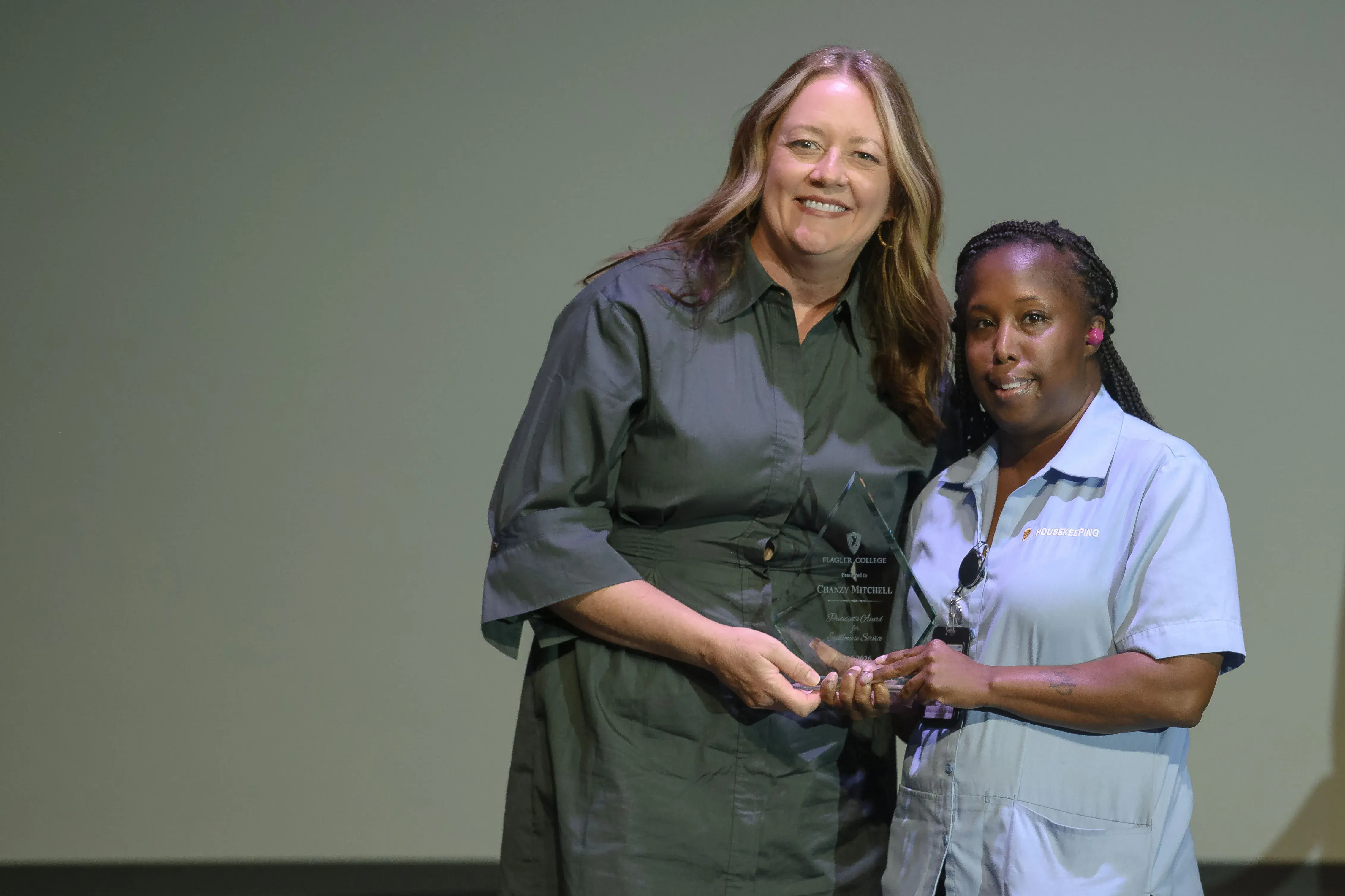 Chanzy Mitchell recieving her president's award