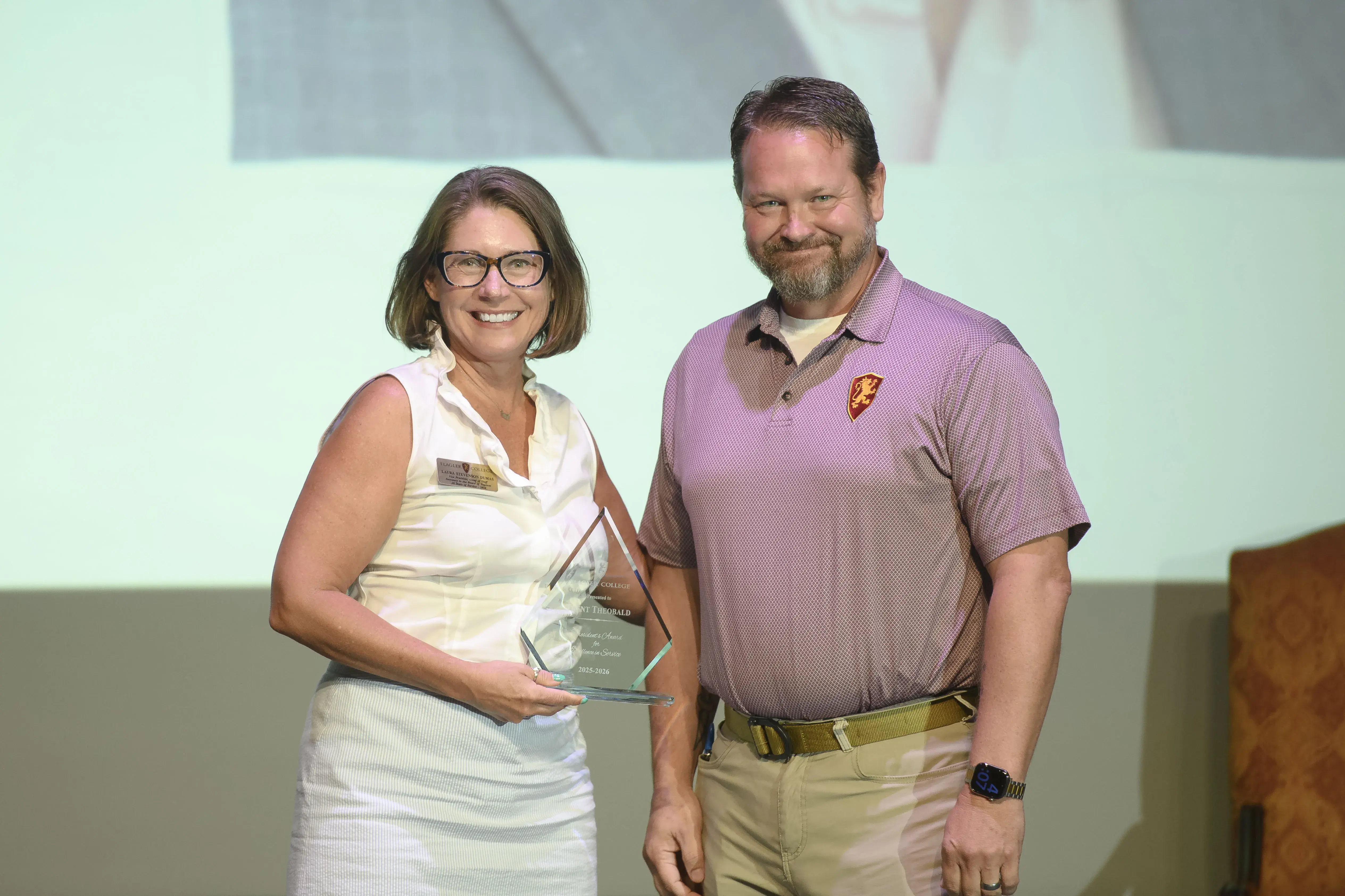 Trent Theobald receiving his president's award